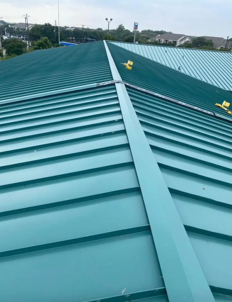 Green commercial metal roof ridge and valley for Metal Roof Repair in Pace